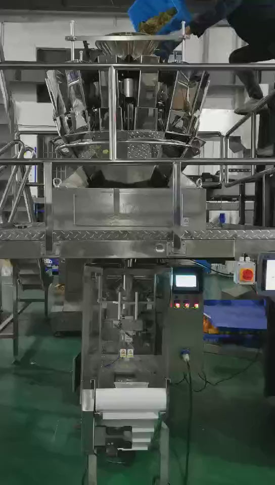 Volumetric cup filling VFFS machine with PLC servo control for granule and mixed powder snack food and nut packaging.