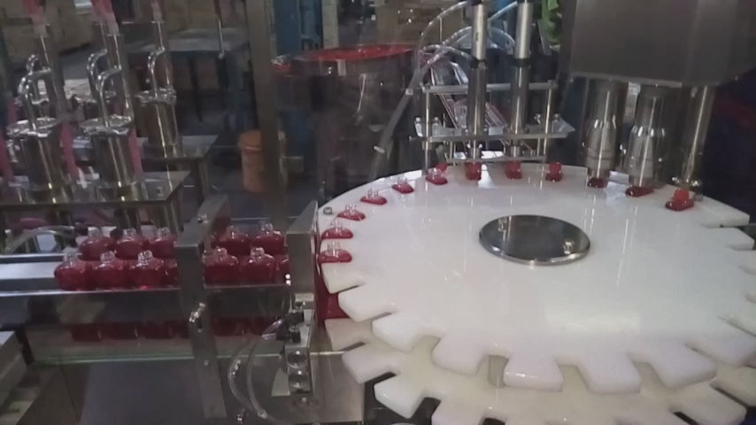 Liquid filling production line Keypack Intelloigent series automatic filling capping and labeling workflow with PLC touch screen control for vegetable oil and beverage bottling