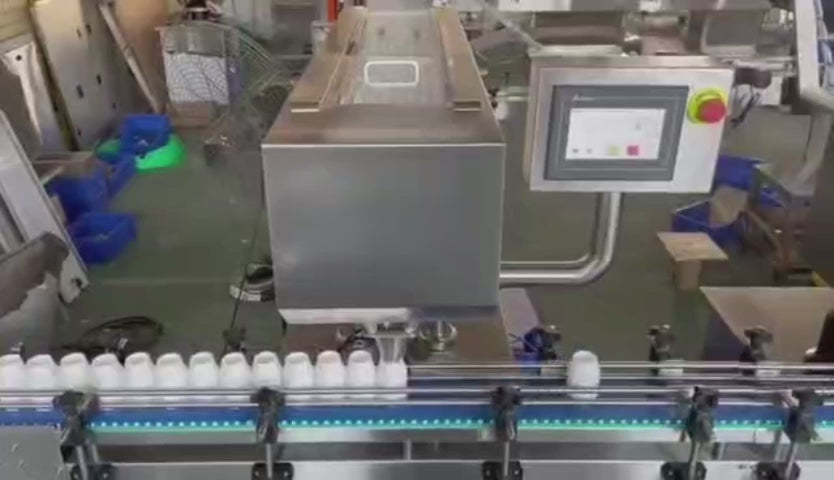 This video demonstrates the Keypack Intelligent automatic bag feeding machine performing sachet dispensing and pouch insertion into bottles on a packaging line. The machine features servo motor control for precise bag advancement, stepper motor-driven tungsten steel blade cutting, automatic feeding leveling to flatten deformed pouches, and real-time deviation correction for consistent positioning. Suitable for pharmaceutical desiccant sachet insertion, food condiment pouch feeding, nutraceutical supplement 