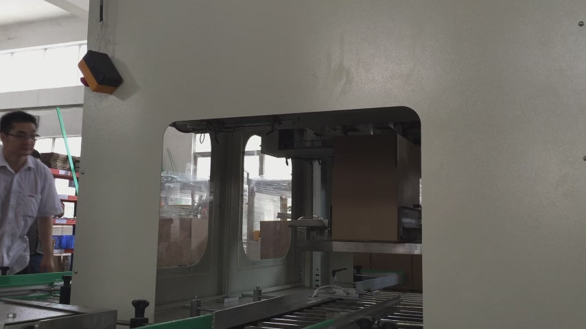 Watch the Carton Inner Bagging Machine demonstrate automatic box liner insertion with auto cover folding and one-pass sealing. This bag-in-box packaging system operates at low noise levels, processing food packaging, chemical products, and e-commerce cartons. Features blade protection, seamless integration capability, and compact design for efficient production lines.