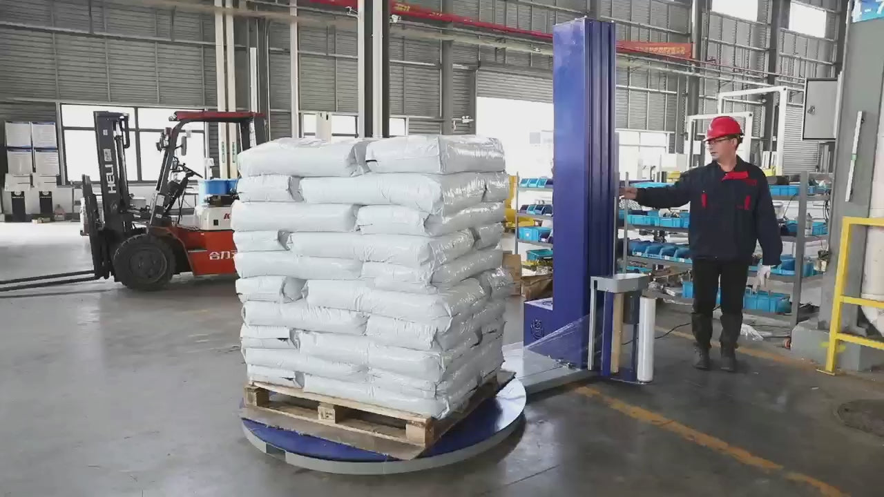 Demonstration of automatic wrapping machine featuring self-propelled operation with 250% pre-stretch film carriage for efficient pallet wrapping. Photoelectric sensor automatically detects cargo height for precise wrapping coverage. Safety guard design provides auto-stop protection when obstacles are detected. Wrapping parameters including layers, speed, and film tension are fully adjustable. Top and bottom wrapping cycles can be independently controlled from 1-9 layers. Frequency-controlled power pre-stret